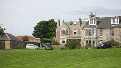 Photo 6x4 Houses, Goose Green Gullane Houses overlooking a big open space c2008