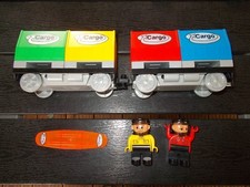 Lego® Duplo Eisenbahn - Intelli - 2 Cargo- Wagen u. Codestein + Lokführer 