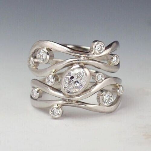 Anillo de banda de diamante simulado de corte ovalado de 2 quilates enchapado en oro blanco de 14 quilates - Imagen 7 de 7