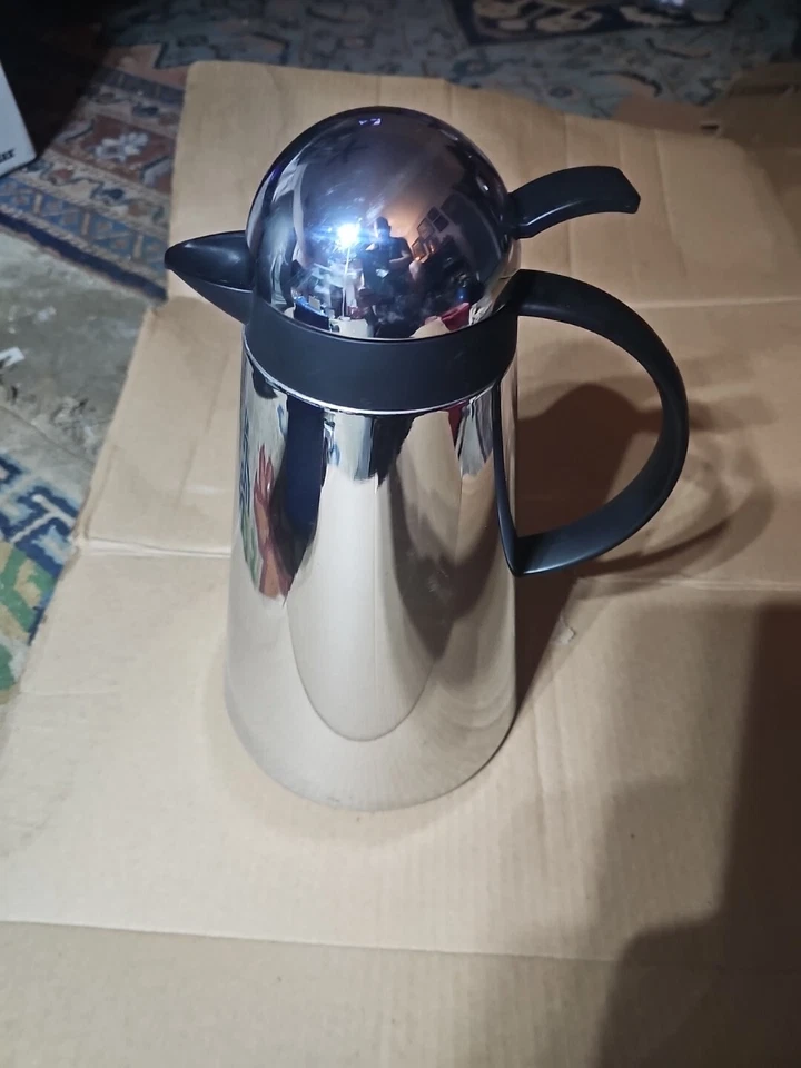 Frasco de vacío de acero inoxidable con acabado de espejo forrado de vidrio base estable termo Foto 4 de 4