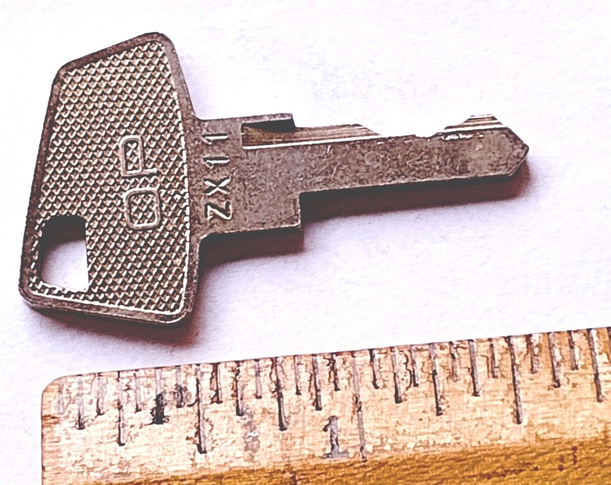 Vintage Key OP ZX11 Appx 1-5/8
