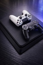 Sony PlayStation 4 Slim   1TB   Console  2 Controllers Read Description 