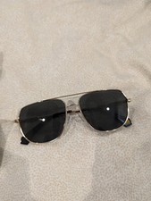 Polaroid Polarized Sunglasses Dark Gray Lens, Gold Frame with Box