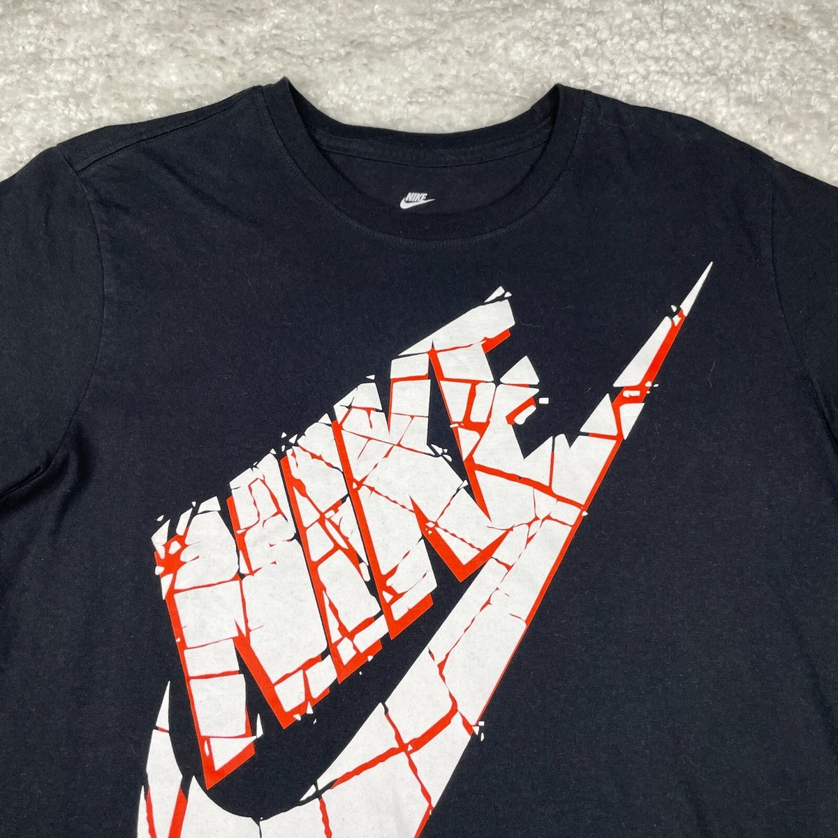 nike broken swoosh t shirt