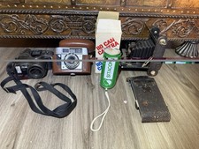 Lot of cameras, don t know how or if they work. As is