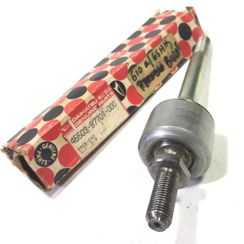 Extremo de cremallera de dirección 1977-1979 Daihatsu Charade genuino NOS Japón 45503-87701-000 Foto 3 de 4