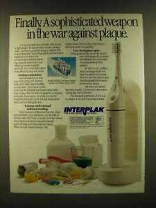 1990 Interplak Toothbrush Ad - Finally. A sophisticated weapon in the