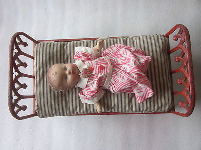 iron doll bed