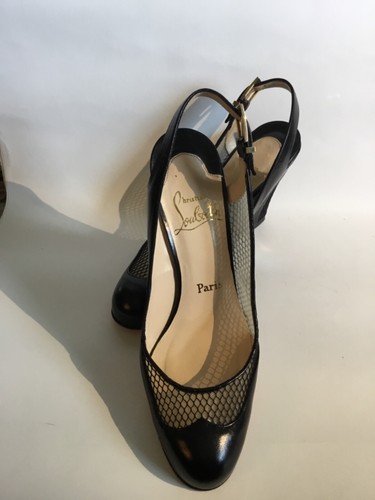 Christian Louboutin Black Leather Round 