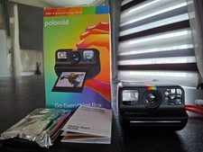 Polaroid Go instant Camera. With pack  of colour film.  Free photo frame