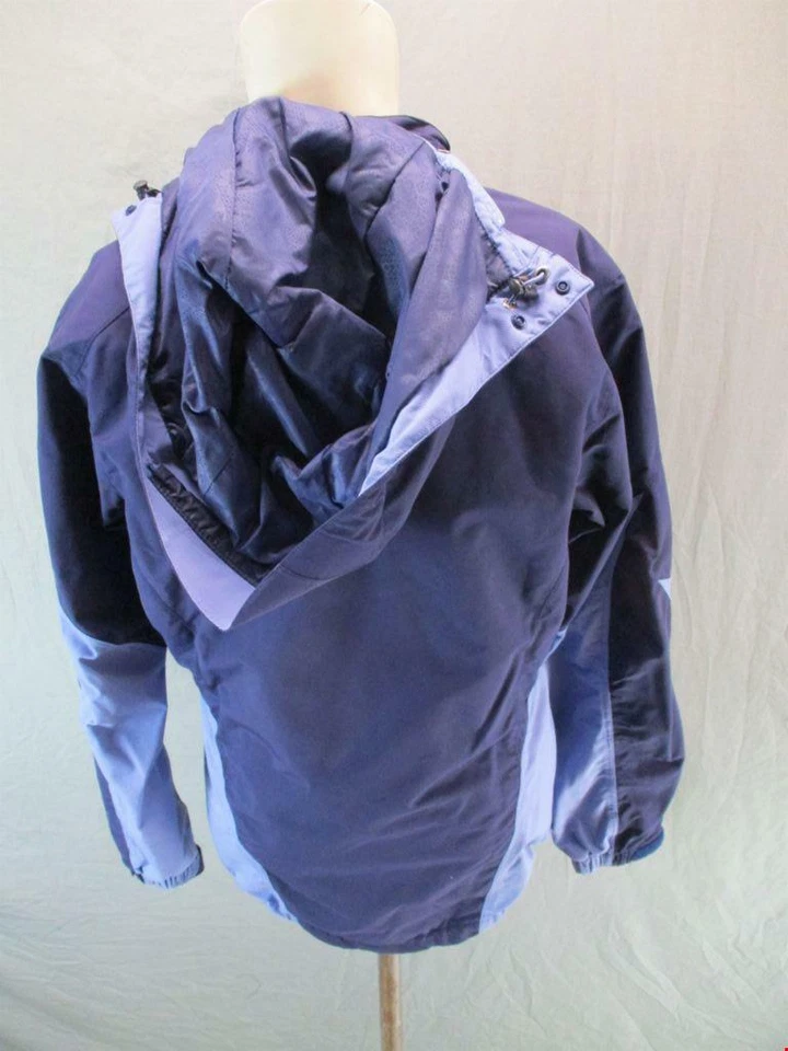Chaqueta acolchada a prueba de viento con capucha forrada de vellón Sherpa azul talla M REI para mujer GR6245 Foto 4 de 4
