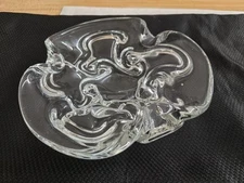 Vtg. mcm heavy, funky clear glass ashtray w/sculptural design.