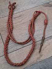 Une fourragère militaria.