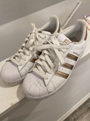 adidas womens shoes with gold stripes
