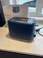 Nutmeg structured two slice toaster never used