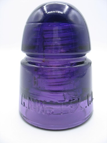 G.N.W. TEL. CO. PURPLE GLASS INSULATOR CD 145