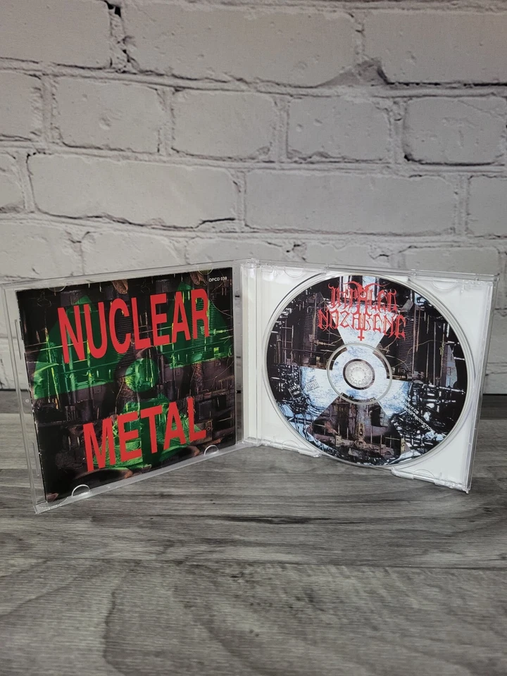 Osmose Impaled Nazarene Latex Cult OPCD-038 Nuclear Metal CD 1st Press Release - Imagem 3 de 4