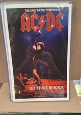 AC/DC POSTER LATE 2000'S  11 X 17 IN TOP LOADER CONCERT BOARD ANGUS YOUNG