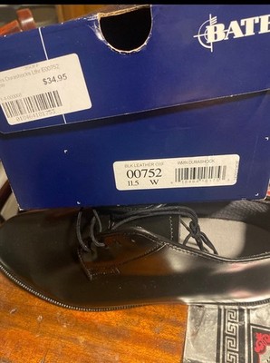 A new Bates man shoe size 11.5Leather upper balance man made material 05/13