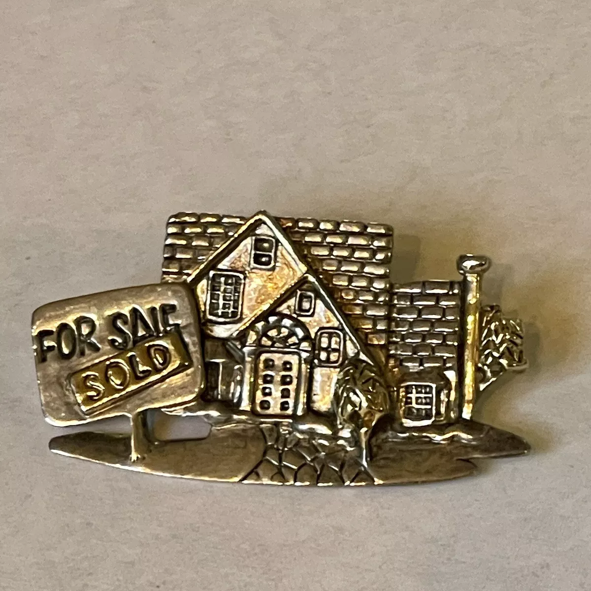 Realtor brooch deals