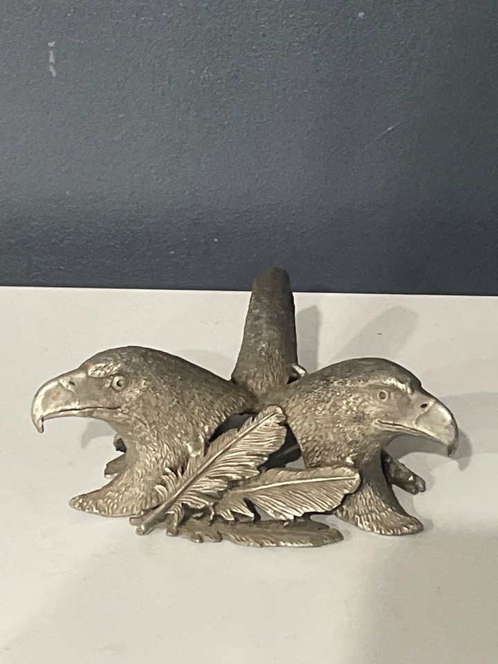 Double bald eagle metal business card holder is peak power-office maximalism — absurdly patriotic and weirdly lovable.
