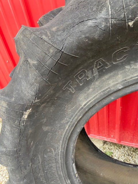 Armstrong 14.9 x 24 tractor tire 100% tread HEAVY CRACKS to Side Walls ...