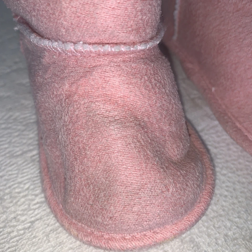 Botas forradas de lana de cordero UGG rosa 6/12 m (2/3C) usadas Foto 2 de 4