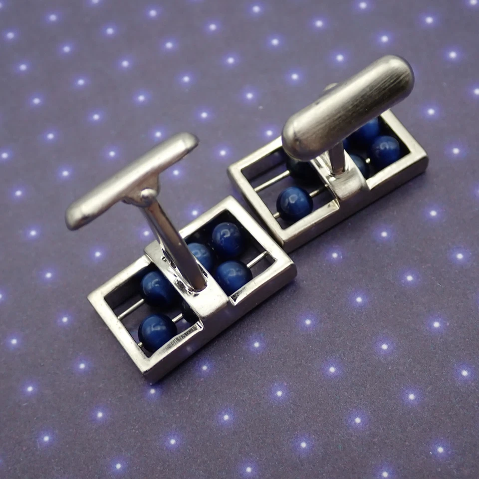 Gemelos vintage Kenneth Cole NY ábaco azul tono plata caja original Foto 2 de 4