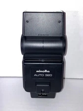 Minolta Auto 320 flash unit with original case - tested and working