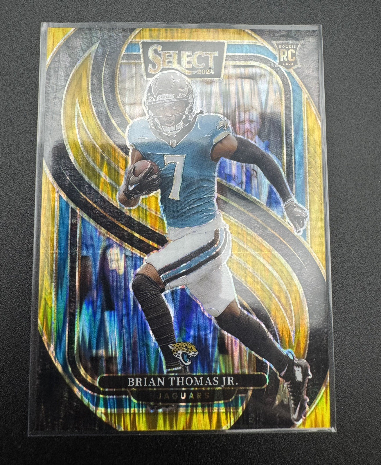 2024 Panini Select Premier Gold Prizm Shock #91 Brian Thomas Jr. RC JERSEY# 7/10