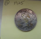 1925 PEACE SILVER DOLLAR
