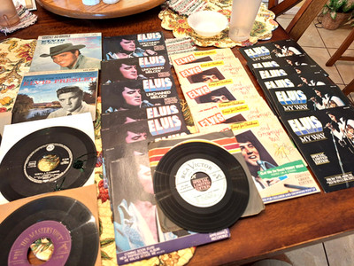 26 Elvis Presley 45's. Some old some new.