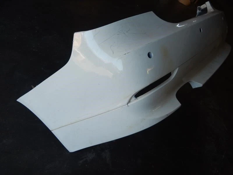 04 05 06 07, BMW 545I, Parachoques trasero sin asistencia de piezas, Blanco, N.º de parte: 51127077940 Foto 2 de 4