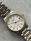 Rotary Vintage Men’s Watch Silver Gold Date Quartz Stainless Steel Roman Numeral