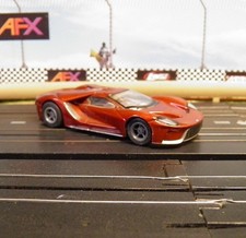 AFX Mega G used Liquid Red Ford GT-40. Track tested runs Great.