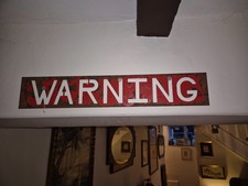 Red Steel Warning Sign