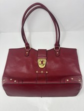 Chic Etienne Aigner burgundy leather shoulder tote with polished brass hardware