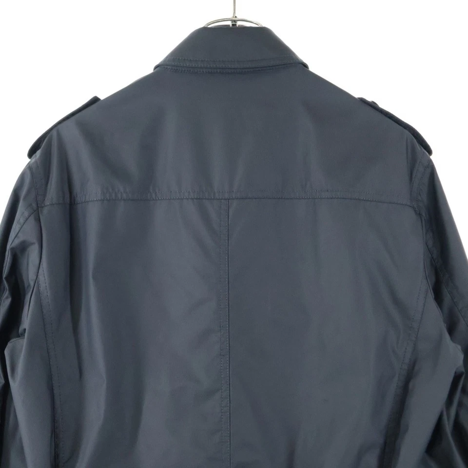 Gabardina larga de nailon negra Calvin Klein 414514 usada 58d337c43304ef7537287e59f4 Foto 4 de 4