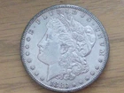 Two Morgan Silver Dollars 1880 O,S