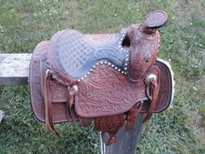 Vintage Hand Tooled Child's Saddle Made for Kenny Rogers' Son Vintage Hand Tooled Child's Saddle Made for Kenny Rogers' Son