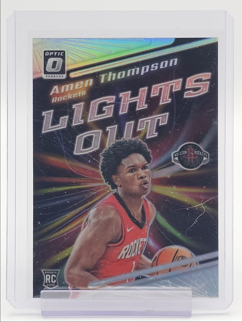 AMEN THOMPSON 2023-24 DONRUSS OPTIC LIGHTS OUT ROOKIE HOLO PRIZM RC Q3916