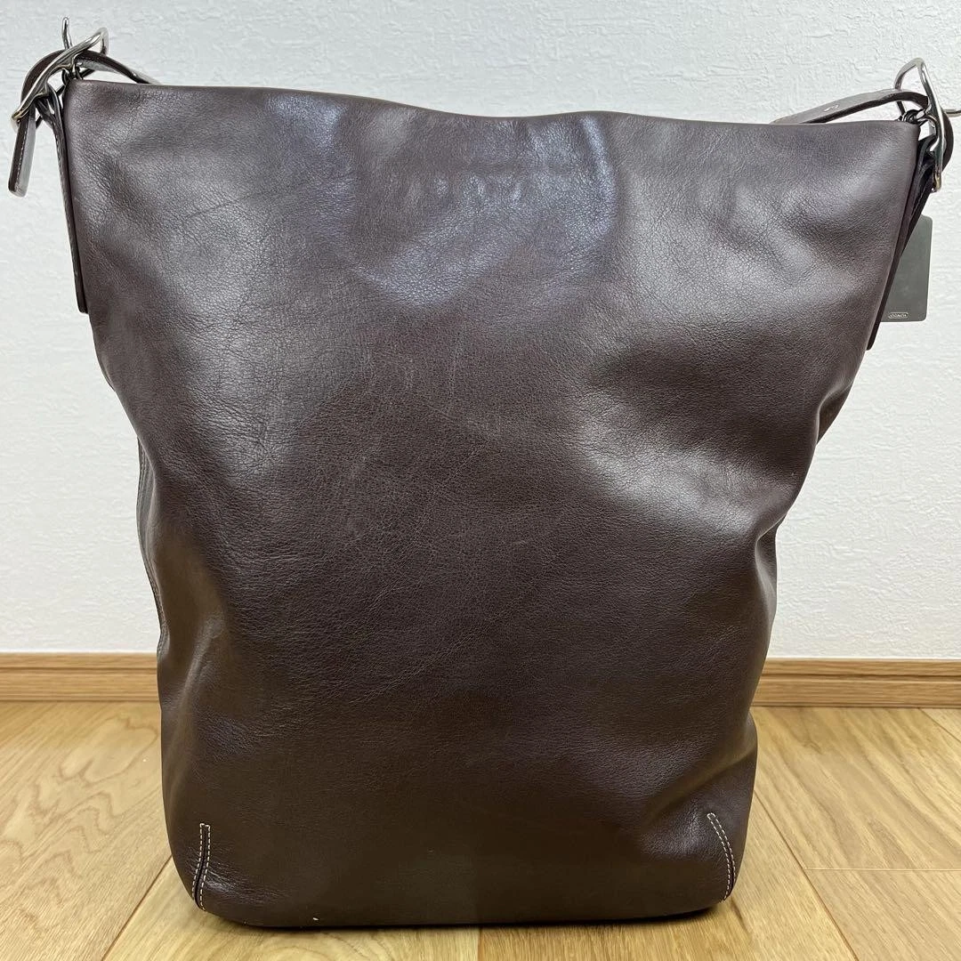 Vecchia borsa a tracolla Coach tipo secchiello pelle marrone scuro come nuova dal Giappone