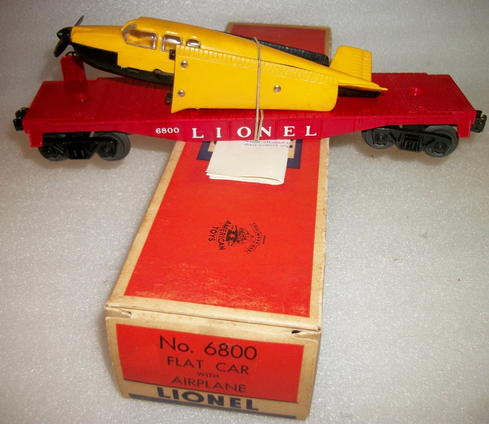 LIONEL POSGUERRA 6800 COCHE PLANO CON AVIÓN AMARILLO OSCURO/NEGRO COMO NUEVO SIN USAR OB INSTR Foto 2 de 4