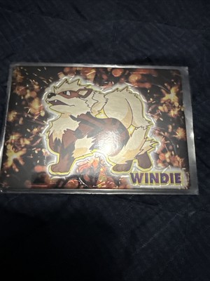 ARCANINE (WINDIE)--JAPANESE MEIJI EMBOSSED PROMO FOIL POKEMON CARD