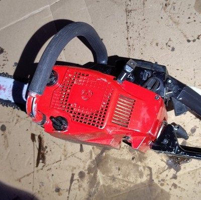 Gasoline Chainsaw Model 251 Two-Handed Grip Red Black Metal Plastic