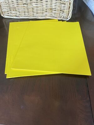 Set of 4 office depot 3-hole punched yellow folders 