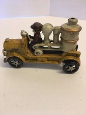Vintage Antique Cast Iron Fire Truck Engine Vehicle Yellow with Fireman 6.5"
