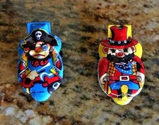 Vintage tin litho child's tin Pirate Halloween noisemaker clickers