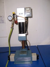 11978 JT&M press A-2066 Pneumatic press cap. 528lbs 120 volt