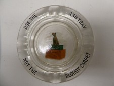 AUSTRALIAN GLASS SOUVENIR DOG ON THE TUCKER BOX USE THE ASHTRAY NOT THE CARPET
